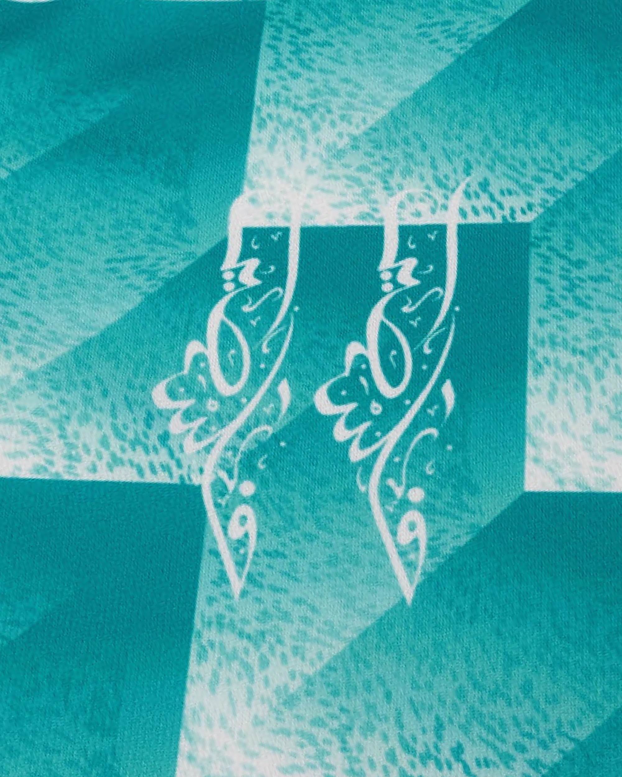 Symbole calligraphique blanc maillot palestine turquoise détail broderie design unique 2025