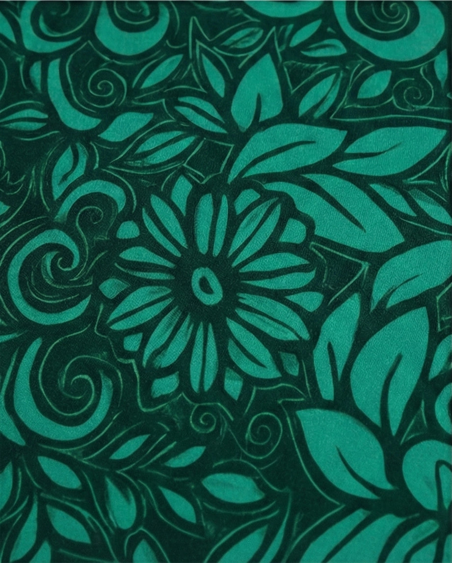 Maillot Palestine vert avec un motif floral détaillé en vert foncé et turquoise.