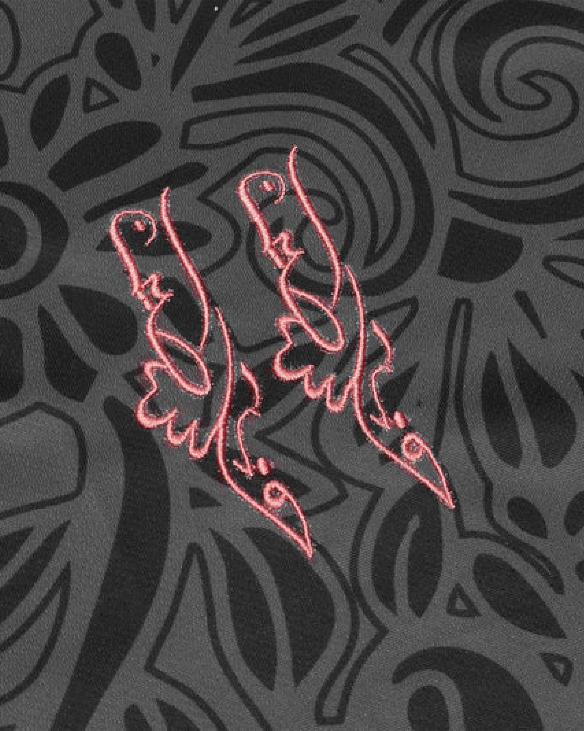 Broderie rose symbole maillot palestine noir et rose détail calligraphie stylisée qualité premium